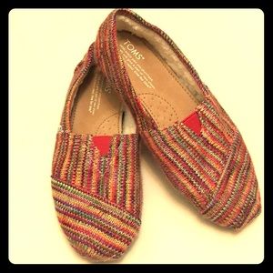 Multicolored woven Toms slip ons